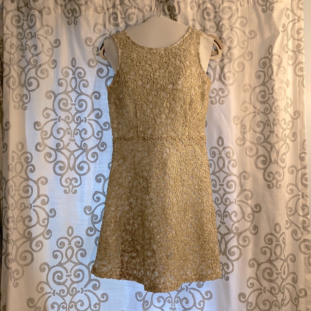 Beautiful gold sequin mini dress with white slip